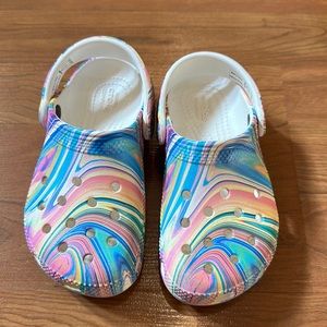 Preowned gently used Toddler girl size 10 crocs.